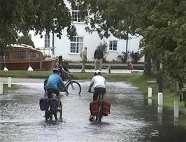 Enjoying the flooded road at Beccles Quay